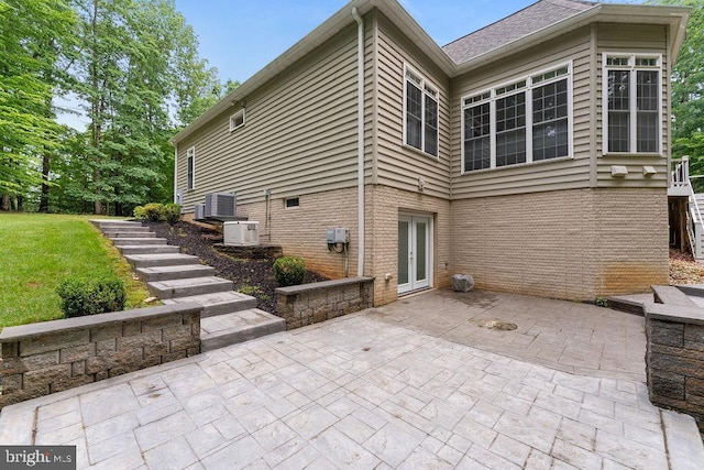 7308 Glenhaven Dr, Fredericksburg, VA 22407 - back of house featuring a patio area