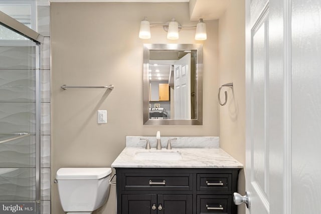 11106 Polaris Ct, Fredericksburg, VA 22407 - bathroom with vanity, toilet, and a shower stall