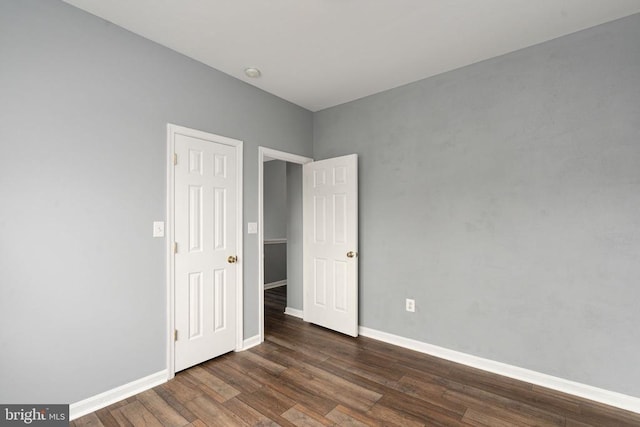 11106 Polaris Ct, Fredericksburg, VA 22407 - spare room with dark wood-style floors and baseboards