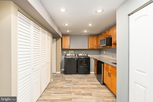 11106 Polaris Ct, Fredericksburg, VA 22407 - kitchen featuring independent washer and dryer, appliances with stainless steel finishes, recessed lighting, light wood-style floors, and light stone countertops