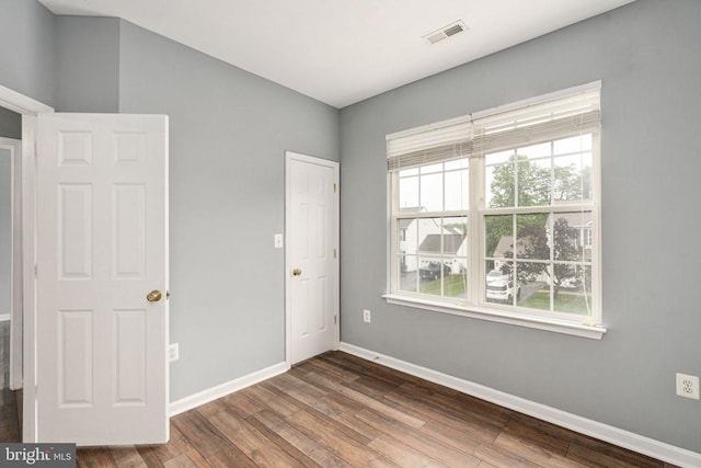 11106 Polaris Ct, Fredericksburg, VA 22407 - unfurnished bedroom featuring baseboards and wood finished floors