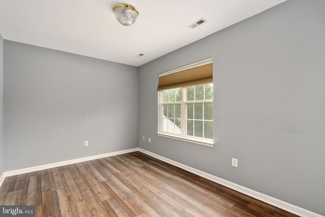 11106 Polaris Ct, Fredericksburg, VA 22407 - unfurnished room featuring baseboards and wood finished floors