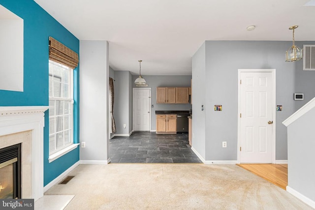 11106 Polaris Ct, Fredericksburg, VA 22407 - unfurnished living room with baseboards, dark carpet, and a high end fireplace