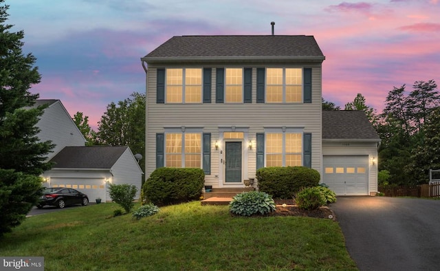 11106 Polaris Ct, Fredericksburg, VA 22407 - colonial home with an attached garage, driveway, and a yard