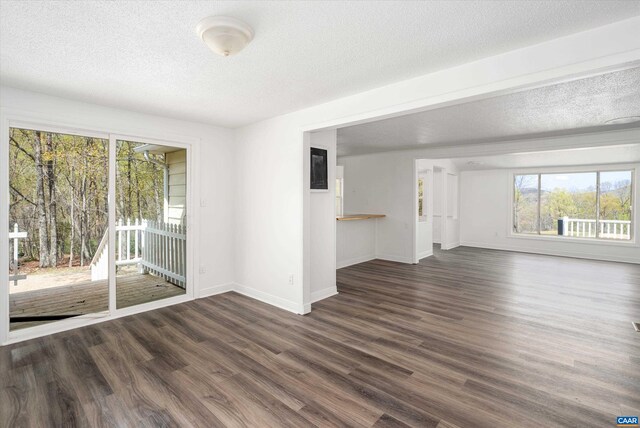 817 Brownings Cv, Shipman, VA 22971 - spare room featuring wood finished floors, baseboards, and a textured ceiling