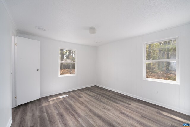 817 Brownings Cv, Shipman, VA 22971 - empty room with plenty of natural light, wood finished floors, and baseboards