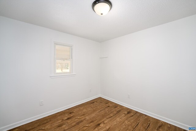 817 Brownings Cv, Shipman, VA 22971 - spare room featuring dark wood-style floors and baseboards