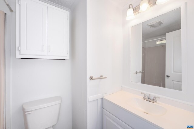 817 Brownings Cv, Shipman, VA 22971 - bathroom with vanity, toilet, and a textured ceiling