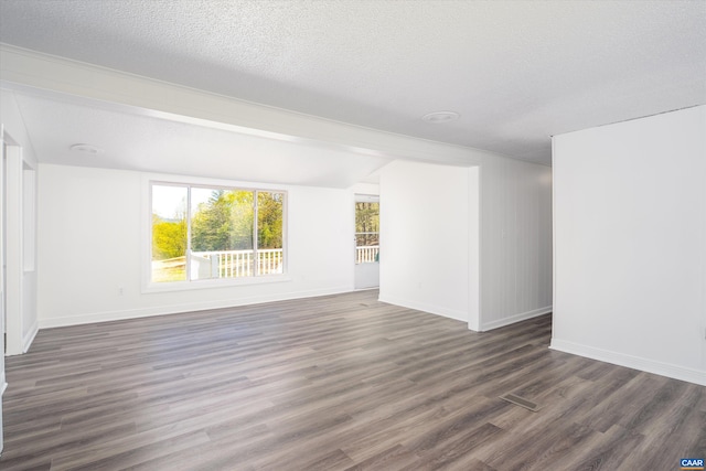 817 Brownings Cv, Shipman, VA 22971 - spare room with wood finished floors, baseboards, and a textured ceiling