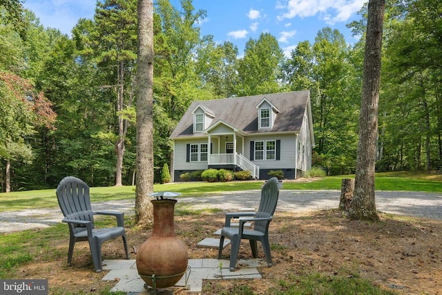 view of front of property featuring a front yard and crawl space