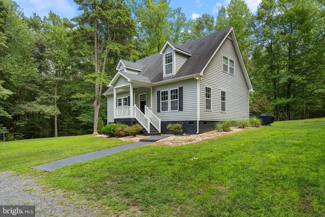 cape cod home with crawl space and a front yard