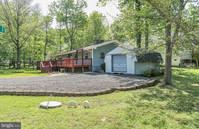 100 Musket Ln, Locust Grove, VA 22508 - view of front of house featuring a deck, a front lawn, a chimney, an outdoor structure, and a garage