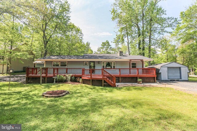 100 Musket Ln, Locust Grove, VA 22508 - rear view of house with an outbuilding, a deck, a lawn, and a chimney