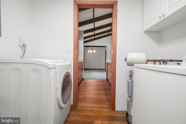 100 Musket Ln, Locust Grove, VA 22508 - laundry area featuring wood finished floors, washer / dryer, and cabinet space