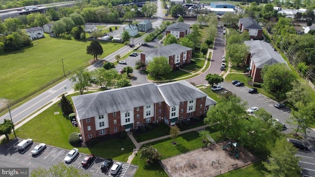 aerial view of property's location featuring nearby suburban area