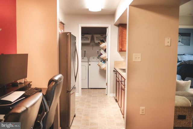 hall featuring separate washer and dryer and an office area