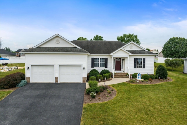 902 Waterton St, Staunton, VA 24401 - view of front of home featuring an attached garage, asphalt driveway, a front lawn, a shingled roof, and brick siding