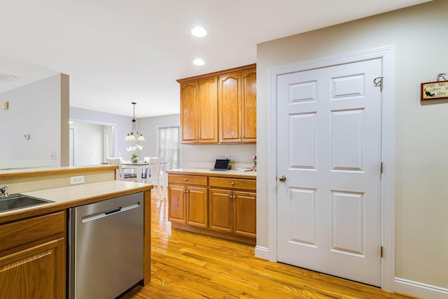 902 Waterton St, Staunton, VA 24401 - kitchen with dishwasher, brown cabinetry, light wood-type flooring, light countertops, and recessed lighting