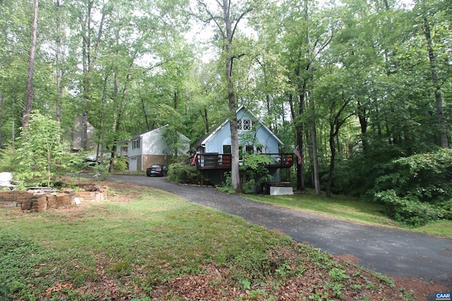 view of yard featuring a wooden deck