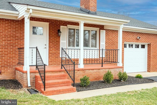 garage with baseboards, water heater, freestanding refrigerator, and a garage door opener