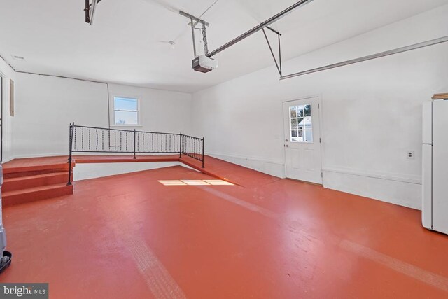 hall with light wood-style flooring, visible vents, baseboards, and recessed lighting