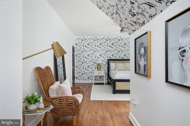 13904 Hunting Run Dr, Fredericksburg, VA 22407 - corridor featuring wallpapered walls, wood finished floors, baseboards, and an accent wall