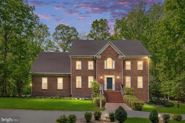 13904 Hunting Run Dr, Fredericksburg, VA 22407 - view of front of house with a front lawn and brick siding