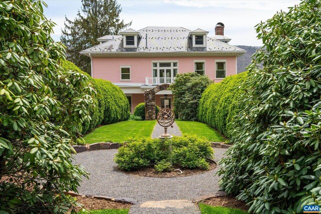 356 Routier Hill Rd, Hot Springs, VA 24445 - back of property with a chimney and a lawn