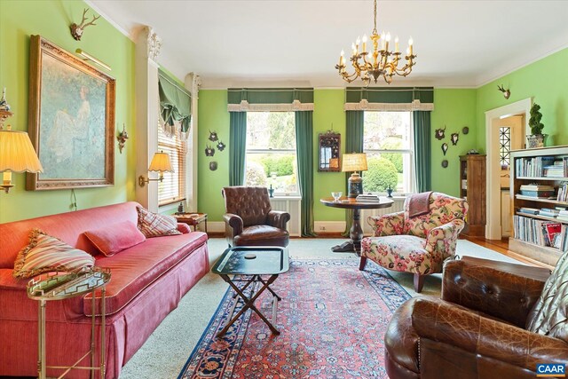 356 Routier Hill Rd, Hot Springs, VA 24445 - carpeted living area featuring a chandelier and ornamental molding