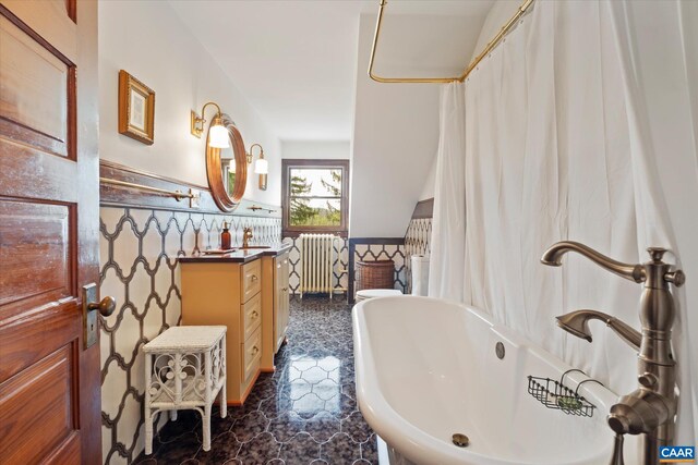 356 Routier Hill Rd, Hot Springs, VA 24445 - full bath featuring radiator heating unit, a freestanding bath, vanity, and tile patterned floors