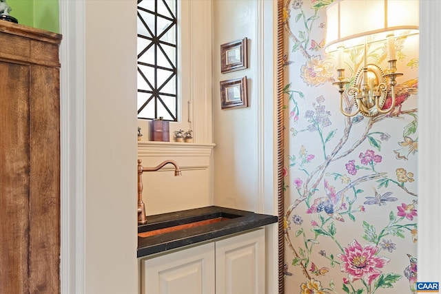 356 Routier Hill Rd, Hot Springs, VA 24445 - bathroom featuring a sink and a chandelier