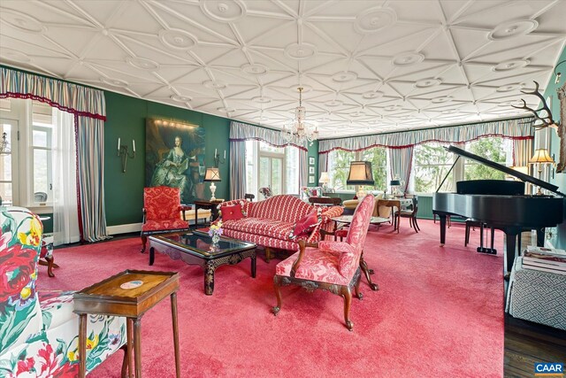 356 Routier Hill Rd, Hot Springs, VA 24445 - living room featuring an ornate ceiling, plenty of natural light, a chandelier, and baseboards