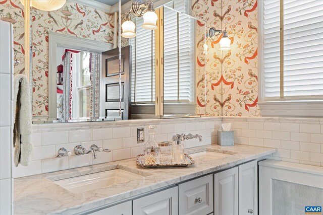 356 Routier Hill Rd, Hot Springs, VA 24445 - full bathroom featuring wallpapered walls, healthy amount of natural light, double vanity, and a wainscoted wall
