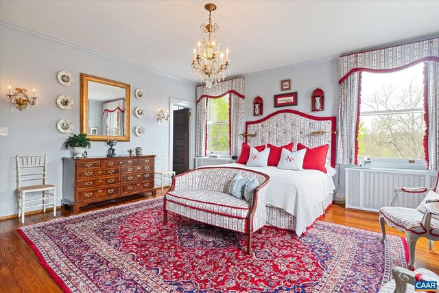 356 Routier Hill Rd, Hot Springs, VA 24445 - bedroom featuring radiator, a chandelier, ornamental molding, and wood finished floors