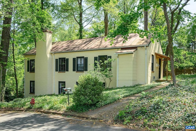 1704 Rugby Cir, Charlottesville, VA 22903 - view of property exterior with a chimney
