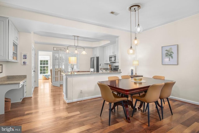 9204 Saint Andrews Ln, Fredericksburg, VA 22408 - dining area featuring wood finished floors and baseboards