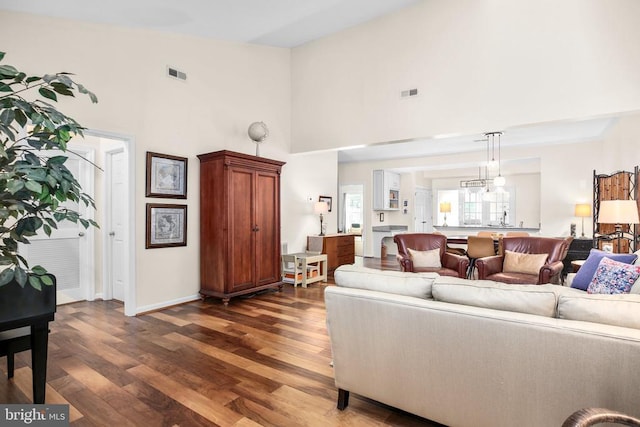 9204 Saint Andrews Ln, Fredericksburg, VA 22408 - living area featuring a high ceiling and dark wood-type flooring