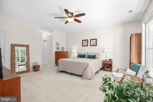 9204 Saint Andrews Ln, Fredericksburg, VA 22408 - carpeted bedroom featuring multiple windows and ceiling fan