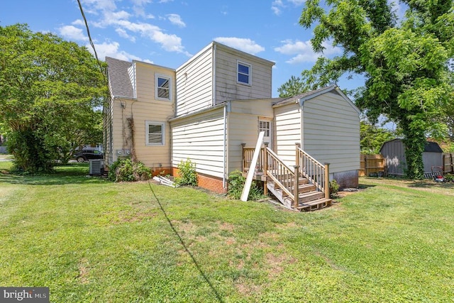 199 Peliso Ave, Orange, VA 22960 - rear view of house with a lawn, a shed, and an outbuilding