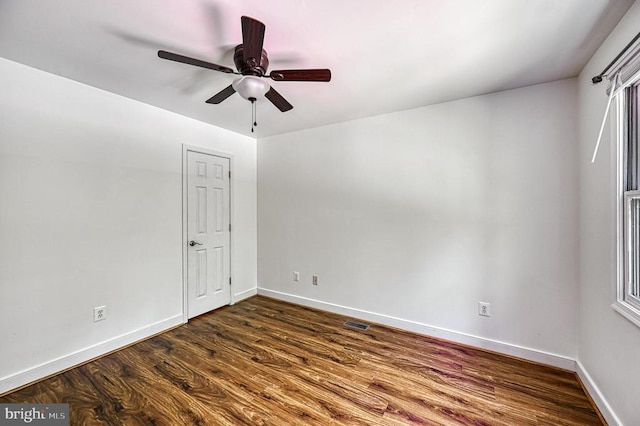 7312 Sugar Hollow Rd, Orange, VA 22960 - spare room featuring dark wood finished floors, baseboards, and a ceiling fan