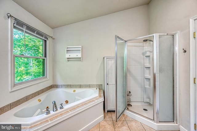 7312 Sugar Hollow Rd, Orange, VA 22960 - bathroom featuring a stall shower, a tub with jets, and tile patterned flooring