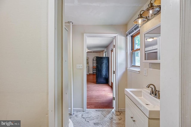 7312 Sugar Hollow Rd, Orange, VA 22960 - hallway with a sink and baseboards