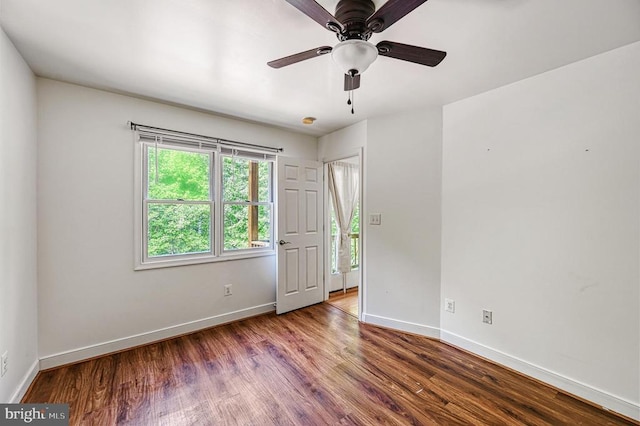 7312 Sugar Hollow Rd, Orange, VA 22960 - unfurnished bedroom with baseboards, wood finished floors, and a ceiling fan