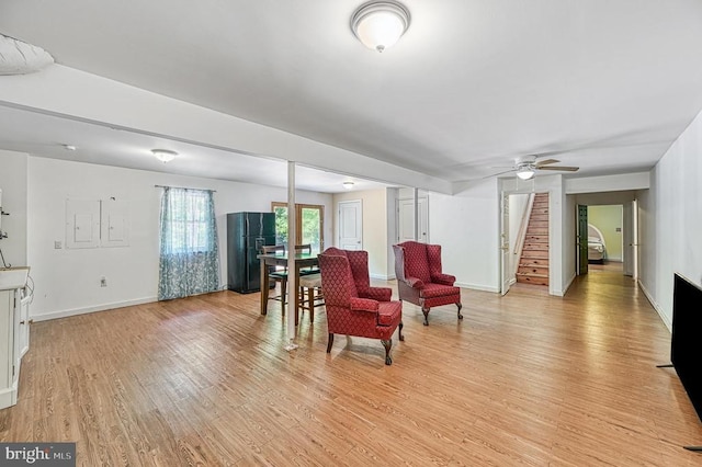 7312 Sugar Hollow Rd, Orange, VA 22960 - living area featuring light wood-type flooring, stairway, baseboards, and ceiling fan