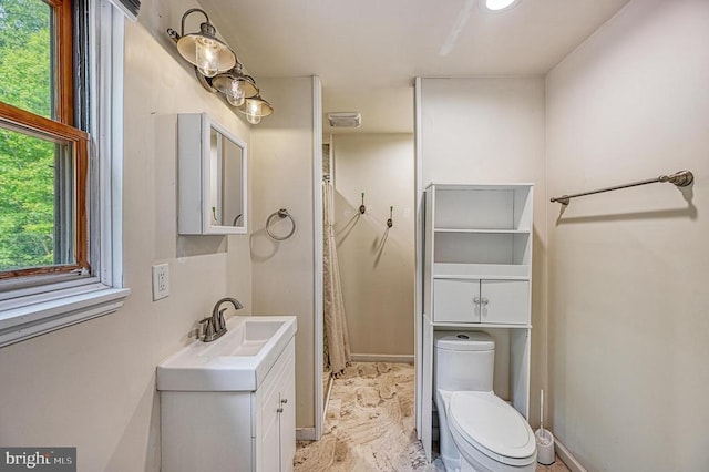 7312 Sugar Hollow Rd, Orange, VA 22960 - bathroom featuring toilet, vanity, and baseboards