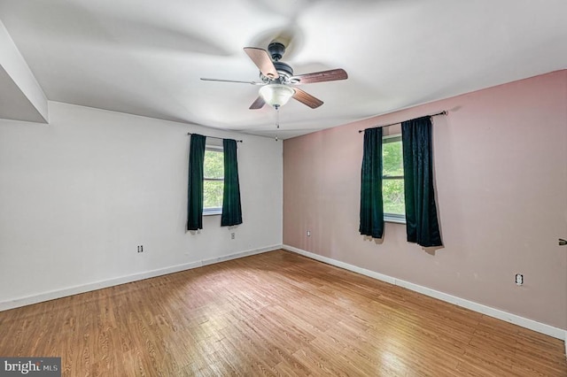 7312 Sugar Hollow Rd, Orange, VA 22960 - spare room with healthy amount of natural light, ceiling fan, wood finished floors, and baseboards
