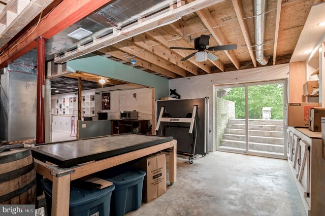  - interior space featuring concrete flooring and ceiling fan