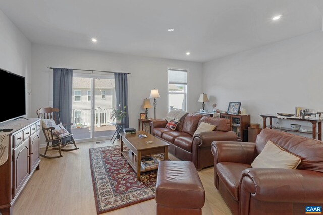 6031 Mccomb St, Crozet, VA 22932 - living area with healthy amount of natural light, light wood finished floors, and recessed lighting