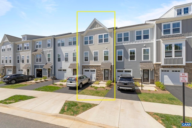 6031 Mccomb St, Crozet, VA 22932 - multi unit property with driveway, stone siding, board and batten siding, and a residential view