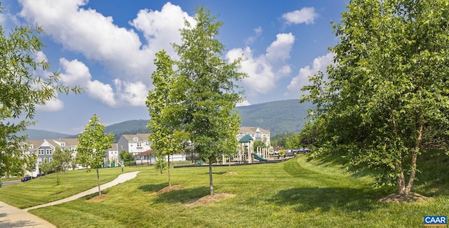 6031 Mccomb St, Crozet, VA 22932 - view of home's community with a mountain view and a yard